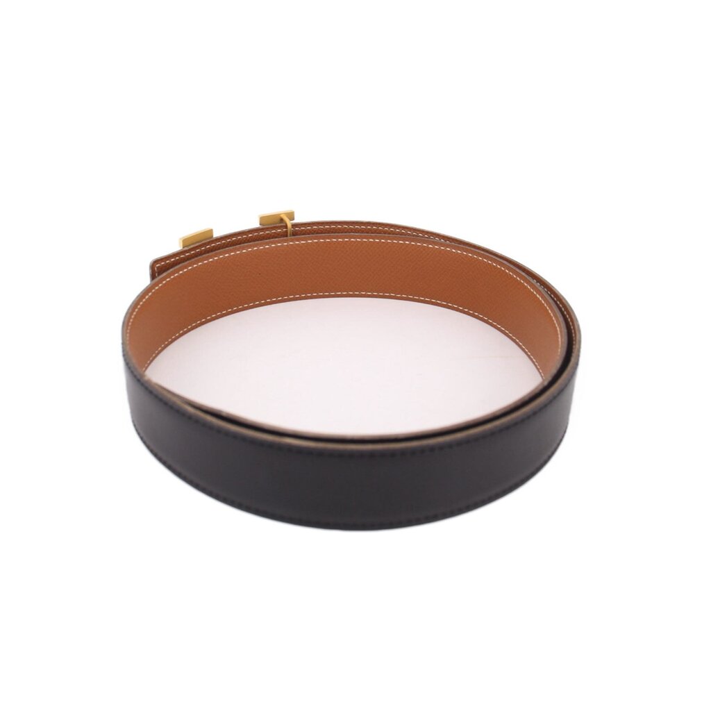Reversible leather belt with tan underside and black outer edge
