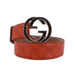 GUCCI interlocking GG belt, rust leather with silver buckle and embossed GG pattern