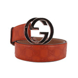 GUCCI interlocking GG belt, rust leather with silver buckle and embossed GG pattern