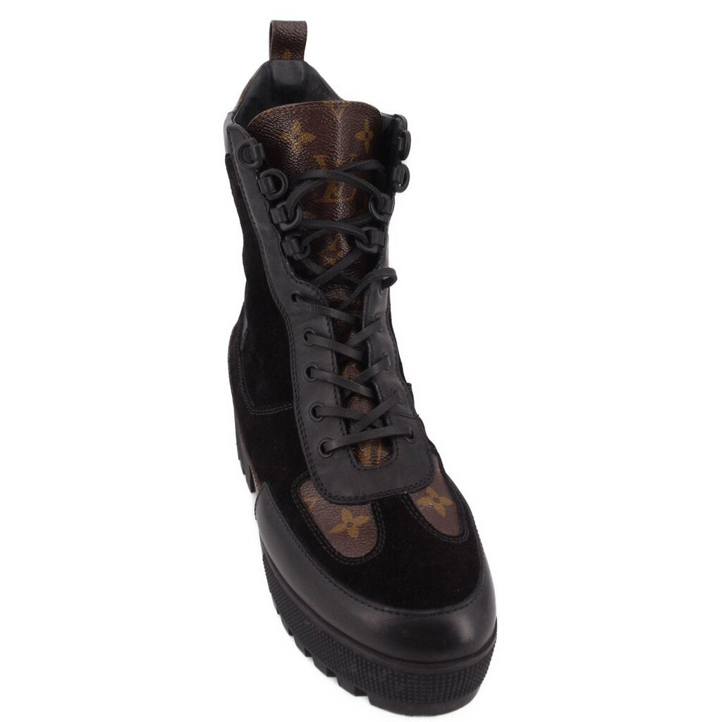 Black monogram lace-up boots with padded collar and lace-up front