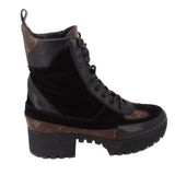 Black and monogram ankle boots with lace-up front and side panel logo