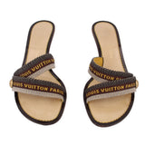 Pair of brown LOUIS VUITTON kitten heel slides with woven logo straps across tops