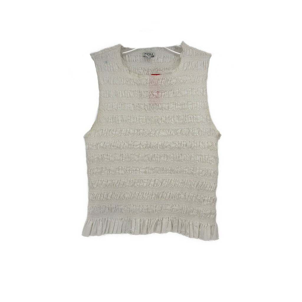 White smocked sleeveless top with crew neckline and ruffled hem