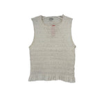 White smocked sleeveless top with crew neckline and ruffled hem