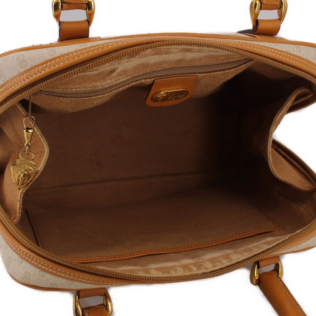 Beige canvas bag interior view with tan leather lining and zipper closure from inside