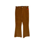Camel corduroy pants, front button closure, belt loops, back welt pockets.
