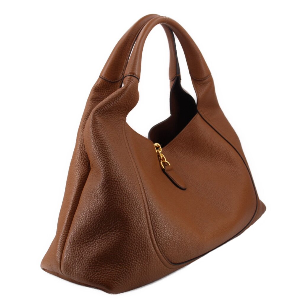 Brown leather maxi shoulder bag with gold clasp and top handles, angled view