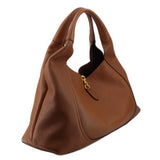 Brown leather maxi shoulder bag with gold clasp and top handles, angled view
