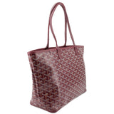 Maroon patterned tote bag with leather handles and angled side profile