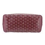 Maroon patterned tote with leather trim and rounded top edge stitching