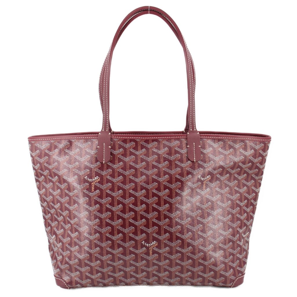 Maroon patterned tote bag with double leather handles and stitched trim