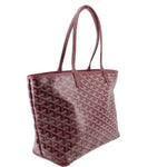Maroon patterned tote bag with leather handles and structured rectangular shape