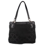 Black shoulder bag with monogram pattern and front snap lock detail