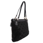 Black monogram shoulder bag with side zip pocket and long leather handles