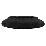 Black monogram tote bag base with rounded bottom and quilted fabric texture