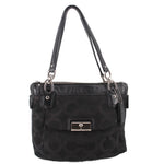 Black shoulder bag with monogram pattern, top zip, and two front pockets