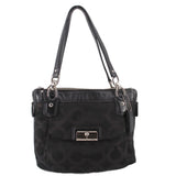 Black shoulder bag with monogram pattern, top zip, and two front pockets