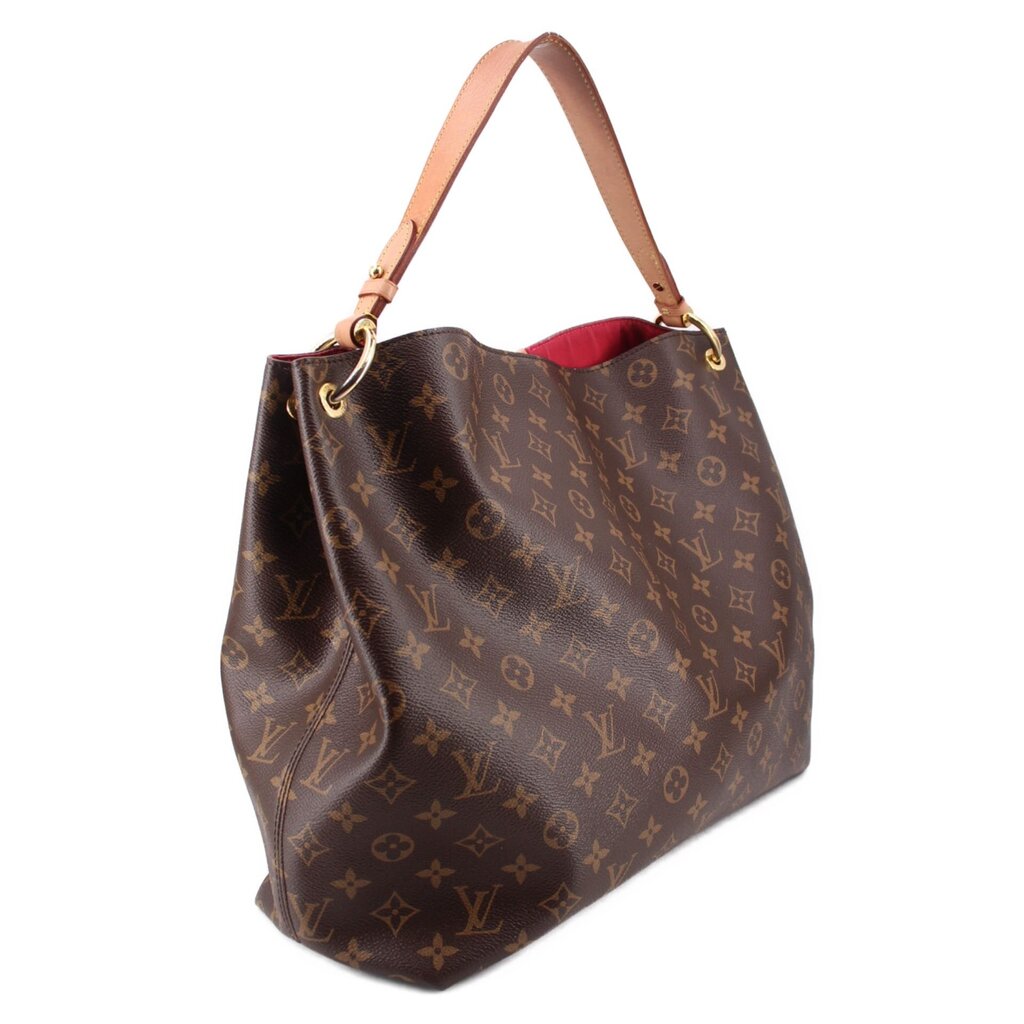 Louis Vuitton Monogram shoulder bag with brown exterior and leather top handles