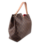Louis Vuitton Monogram shoulder bag, brown exterior with red interior lining visible