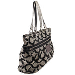 Black and beige op-art shoulder bag, side view with zip pocket and metal hardware