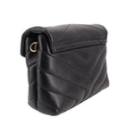 Black quilted leather crossbody bag, top flap and side strap detail with YSL logo
