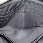 Wristlet pouch interior lining with stitched seams and open zip pocket