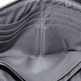 Wristlet pouch interior lining with stitched seams and open zip pocket
