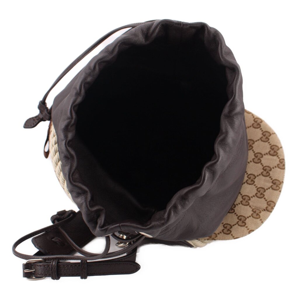 Brown logo bucket bag interior view with black satin drawstring and adjustable leather strap