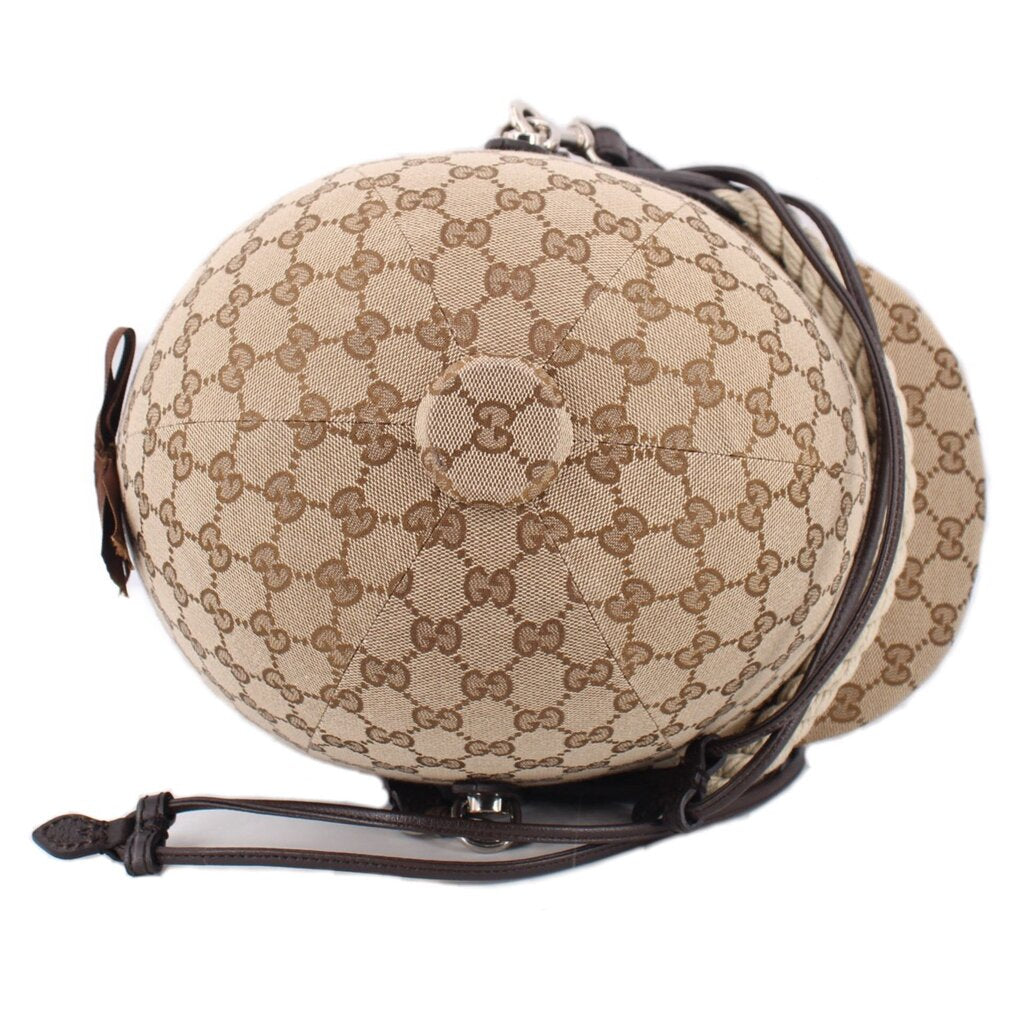Brown logo crossbody bucket bag with GG pattern, front emblem patch, black strap