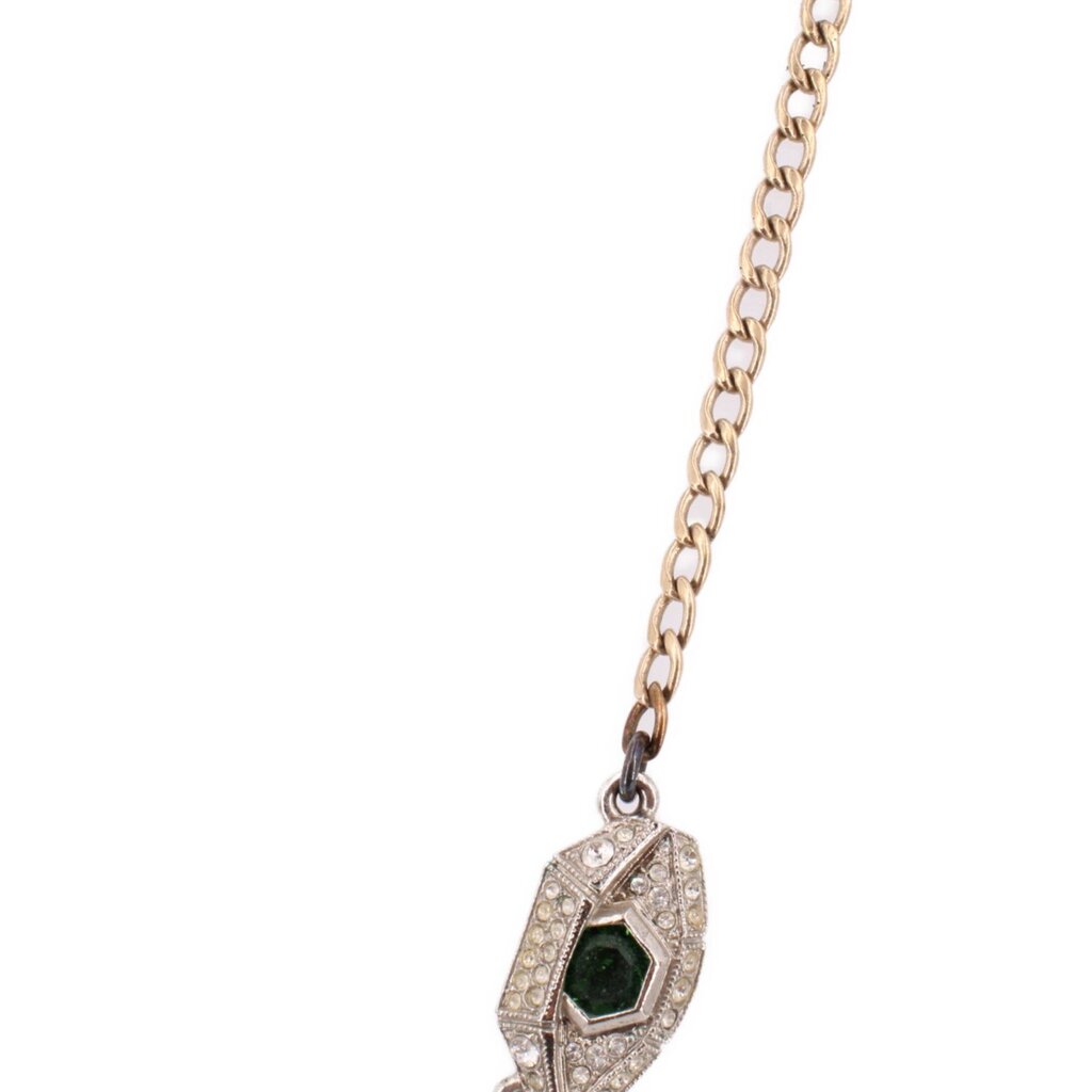 CHANEL gold necklace with crystal heart pendant and green center