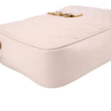 Bone leather crossbody bag top corner close-up with zip track and stitching