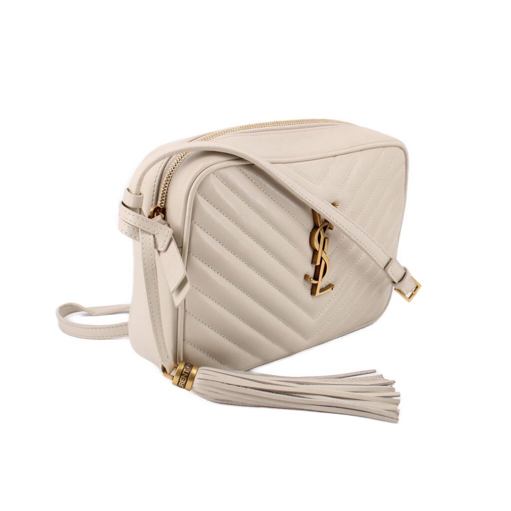 Bone leather camera crossbody bag with quilted pattern, adjustable strap, top zip