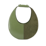 Green split moon shoulder bag with two-tone panels and top handle