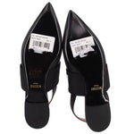 Black slingback ballerina flats, back view with branded insole and heel