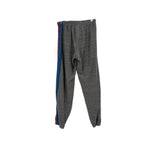 Gray jogger pants with elastic waist and tapered legs, blue side stripe
