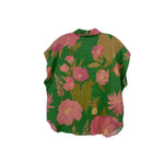 Green floral print button-up top with short sleeves, back view