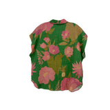 Green floral print button-up top with short sleeves, back view