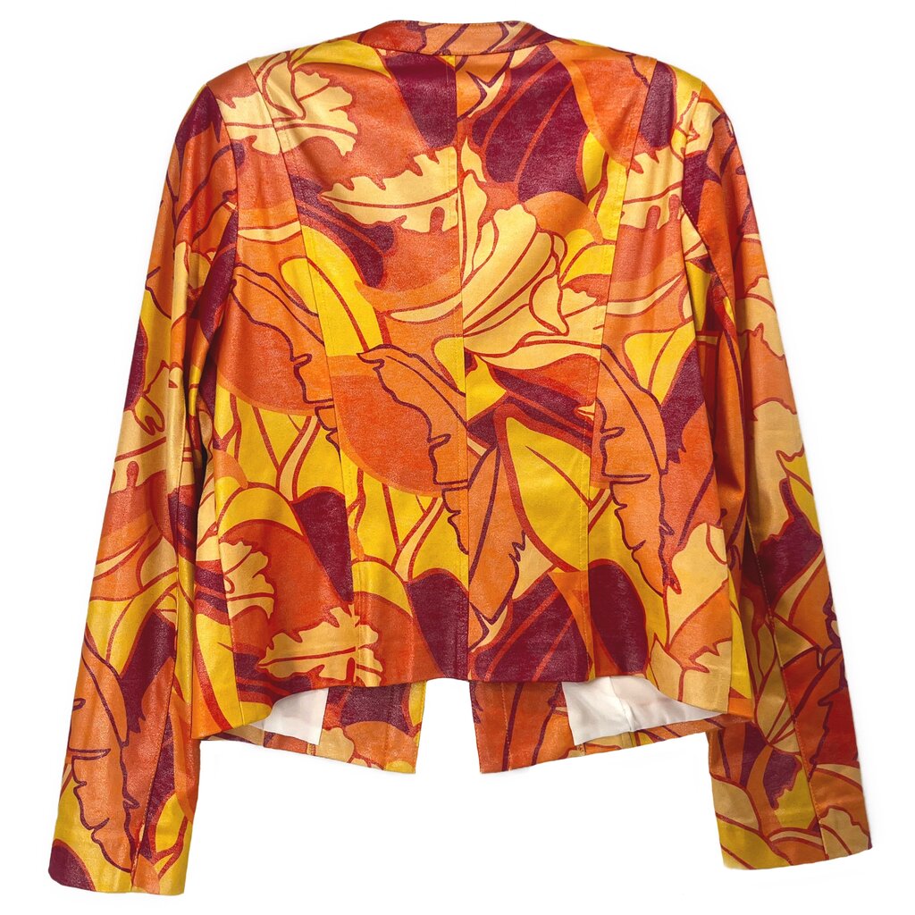 Back view of orange abstract print cropped jacket with long sleeves.