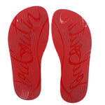 Red flip-flop outsoles with embossed signature lettering