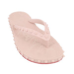 Blush textured flip-flop sandals with toe strap and raised studded sole