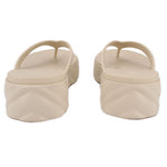 Cream rubber GUCCI flip-flop sandals, heel and back strap detail