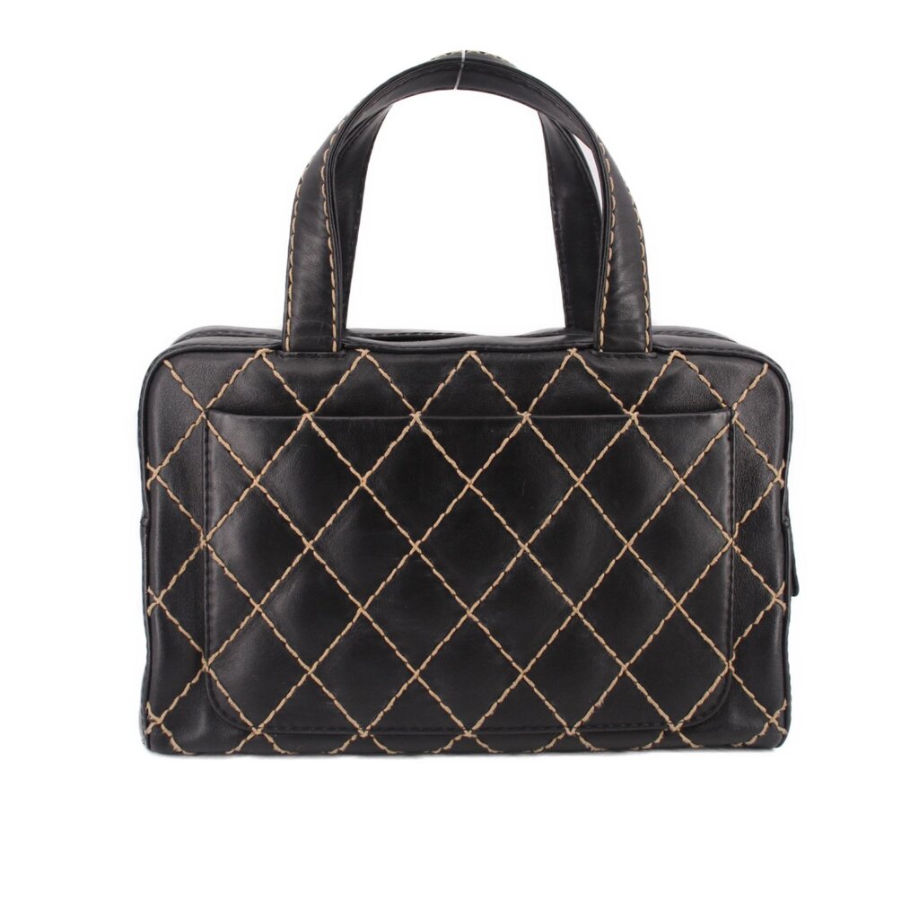 Black quilted handbag with gold diamond pattern and rounded top handles, front view