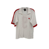 White jersey top with red striped trim, short sleeves, and small red logo on chest