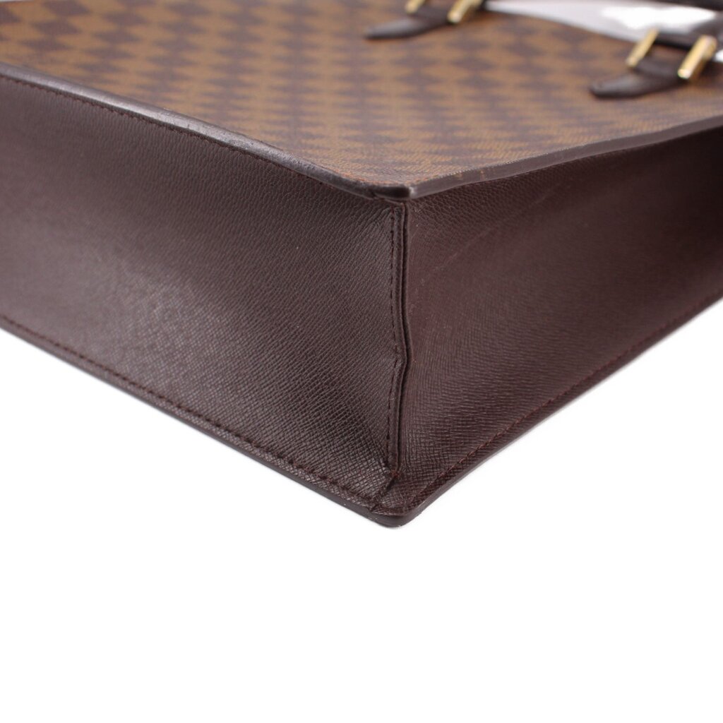 Louis Vuitton Damier Ebene tote bag corner close-up with brown leather edging