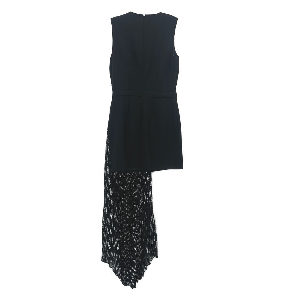 Black sleeveless dress with layered pleated skirt and textured hem panel
