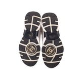 CHANEL cloth sneaker outsoles, dark rubber with patterned traction, beige accents