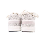 CHANEL cloth sneakers, heel view with white/grey speckled knit and contrast rubber sole