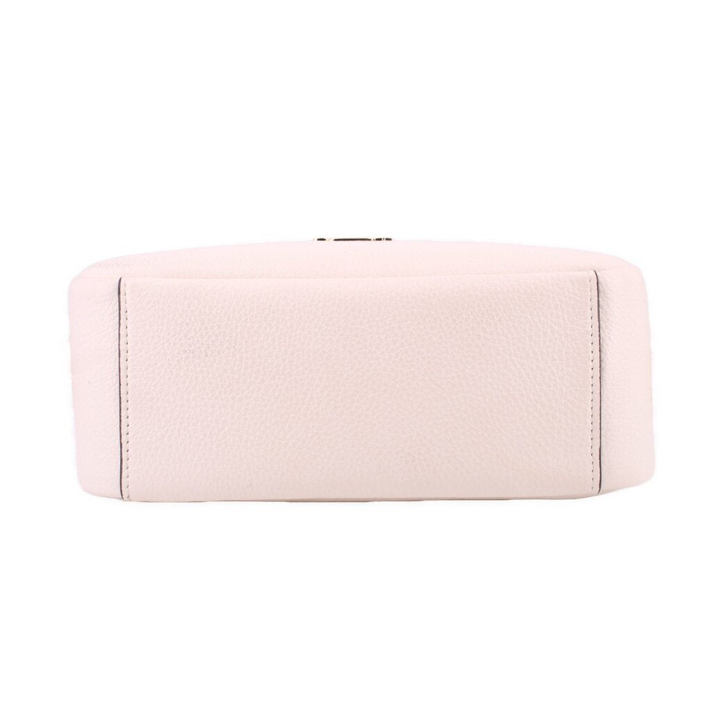 Cream leather crossbody bag back panel with stitched edges and smooth bottom, close view.