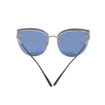 Front view of blue cat-eye sunglasses with gold trim and slim dark temples