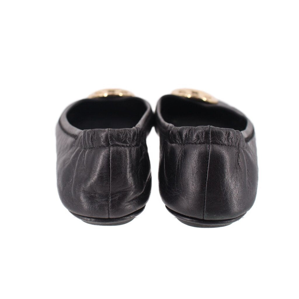 Black leather ballet flats, back view with gathered heel and slip-on opening